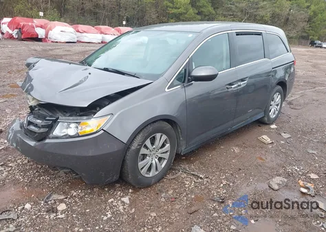 2016 Honda Odyssey Se z USA, uszkodzony, nr VIN 5FNRL5H35GB127249